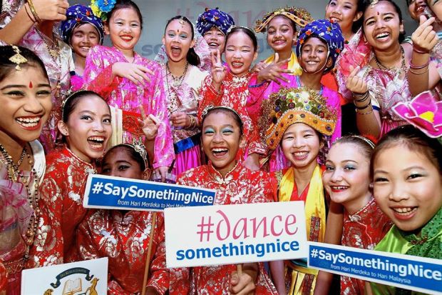 Happy together: Sri Kuala Lumpur students posing together after performing at Sri Kuala Lumpur.